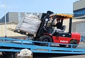 Watch How We Load a Giant Pallet of Galvanized Wire Into a Shipping Container!